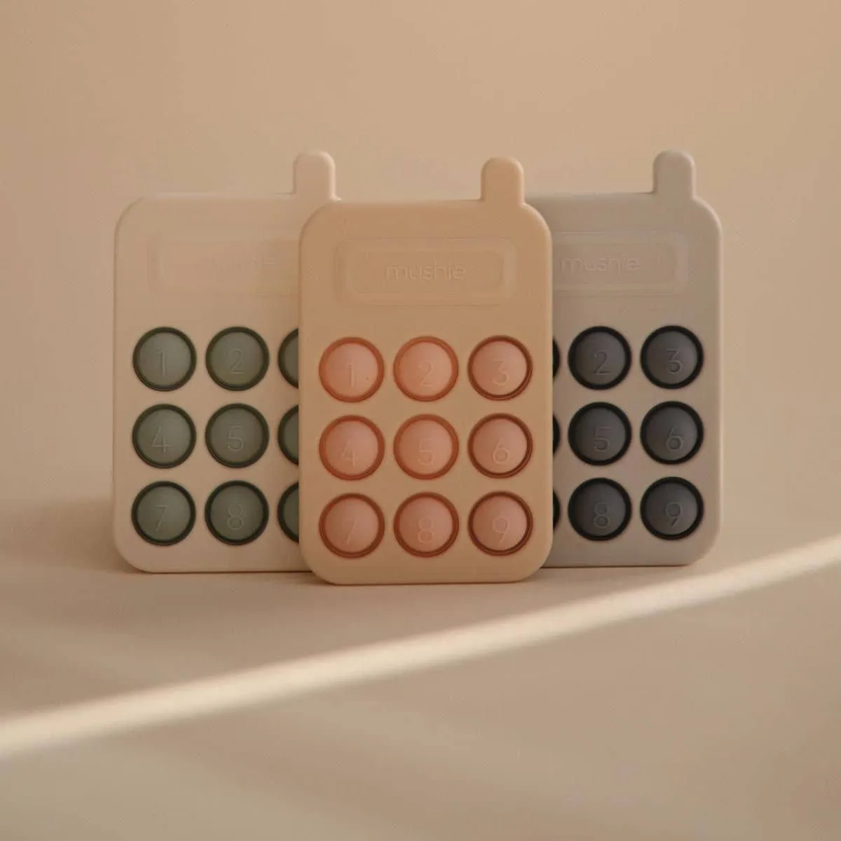 Mushie Phone Press Toy