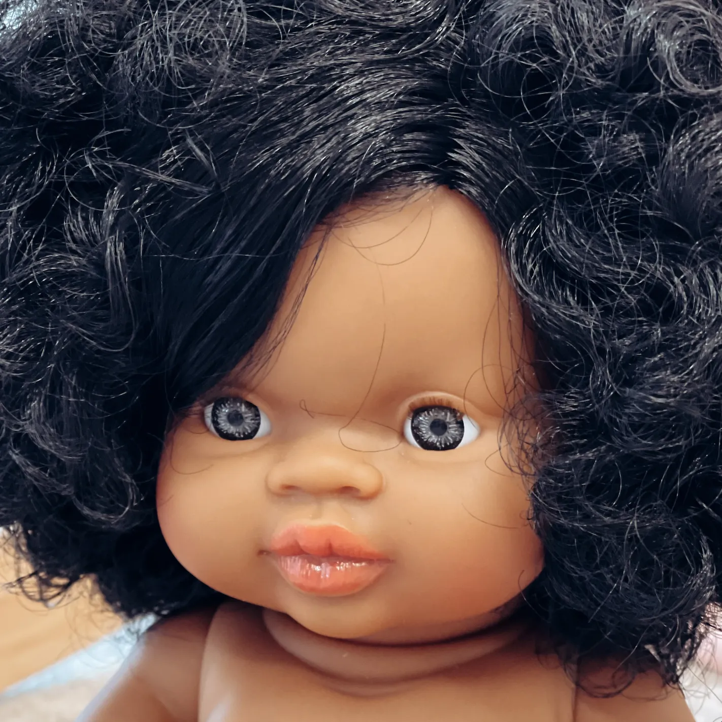 Paola Reina Gordis Dark Hair Baby Girl Blue Eyes - Jazmine